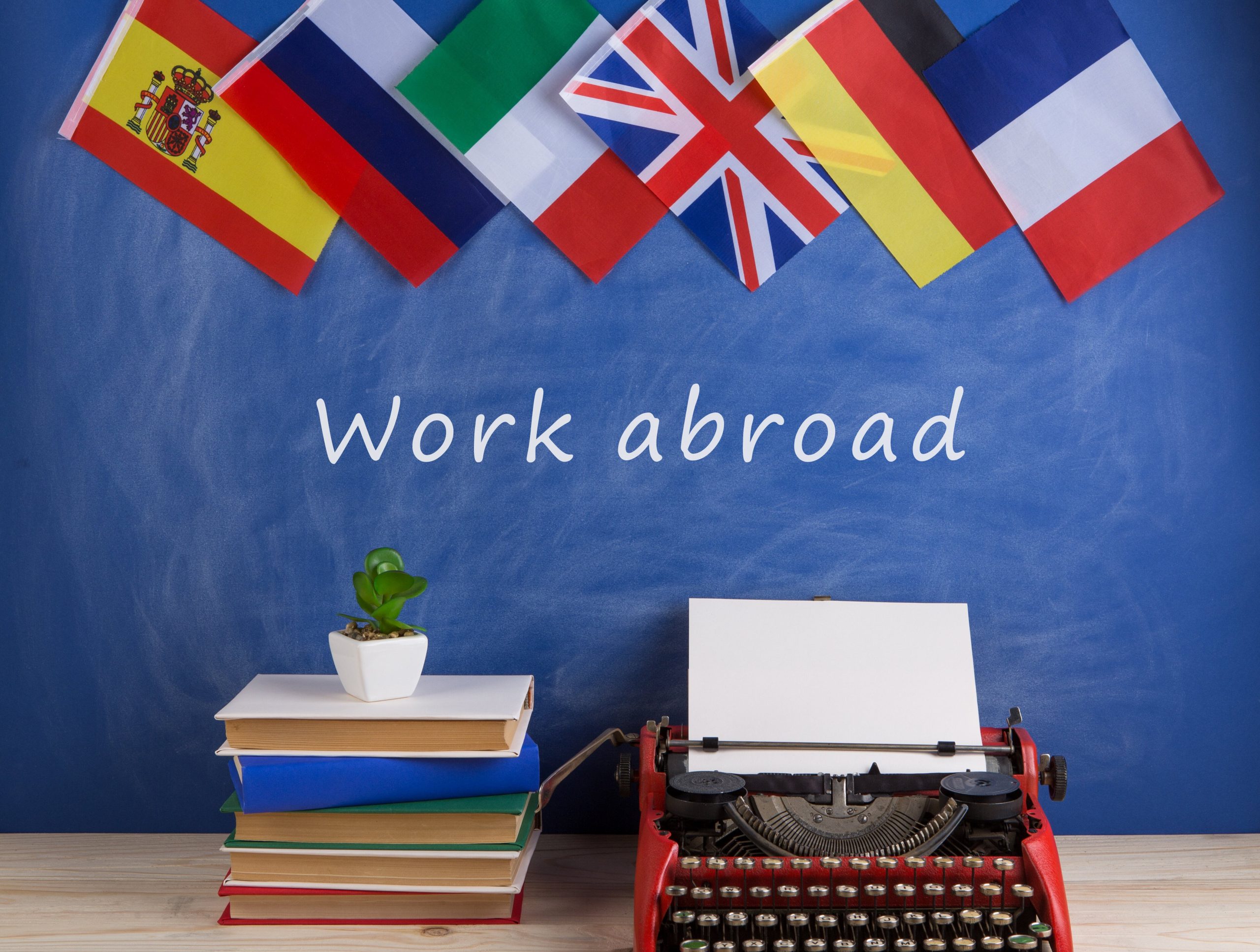 typewriter-flags-spain-france-great-britain-books-other-countries-text-work-abroad (1) (1)